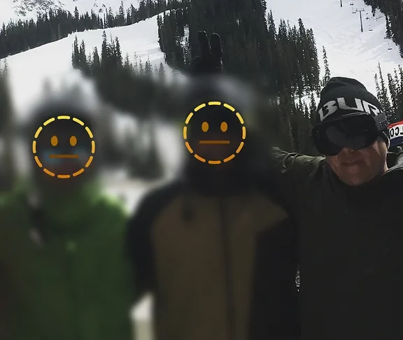 The three co-founders on a ski mountain. Two faces are hidden, by choice.